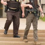 1 dead in Oklahoma college shooting, suspect inside