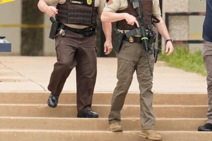 1 dead in Oklahoma college shooting, suspect inside