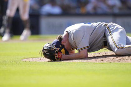 Brewers reliever Varland hit in the jaw by Machado