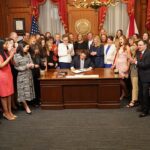 Florida Governor Ron DeSantis signs for six weeks