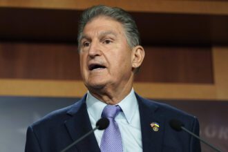 Manchin threatens to support repeal of major