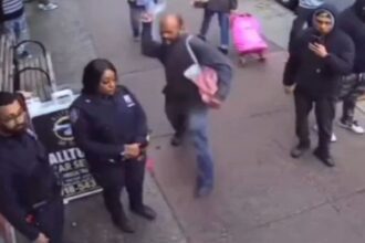 NYPD officer on duty hit randomly in the head