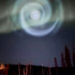 Strange spiral appears amidst the Northern Lights