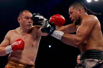 Zhang faces heavyweight title fight after shock