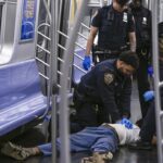 Marine veteran charged with stranglehold on NYC subway