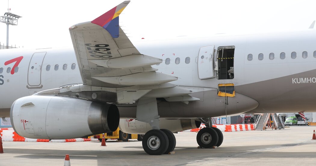 Airplane door opens during flight but jet lands safely