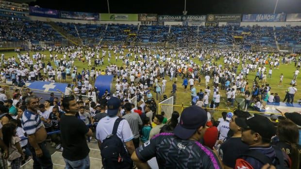At least 9 dead in stampede at football stadium in