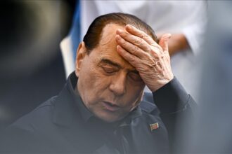 Berlusconi discharged from hospital at 45