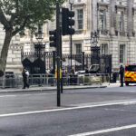 Car enters Downing Street gates where