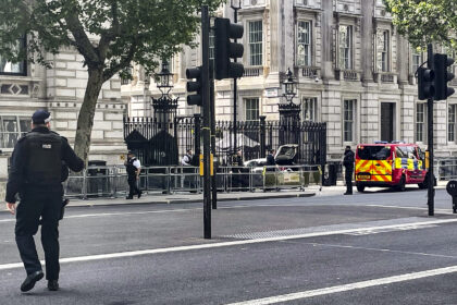 Car enters Downing Street gates where