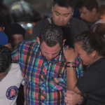 Fans in El Salvador mourn the 12 victims