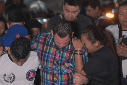 Fans in El Salvador mourn the 12 victims