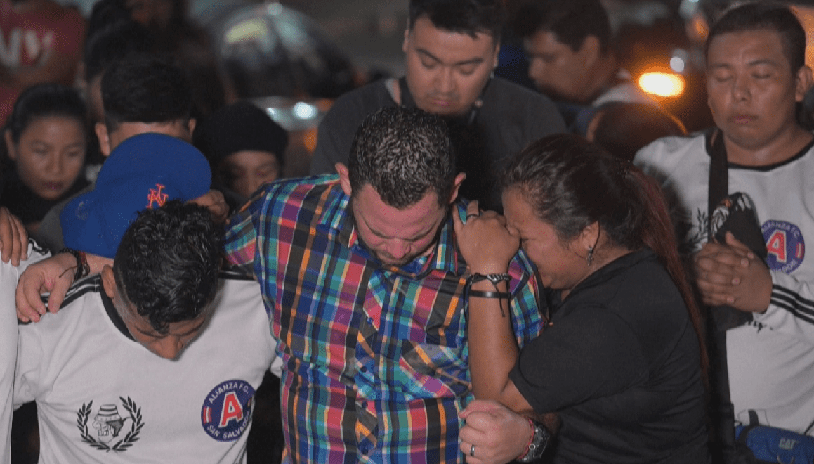 Fans in El Salvador mourn the 12 victims