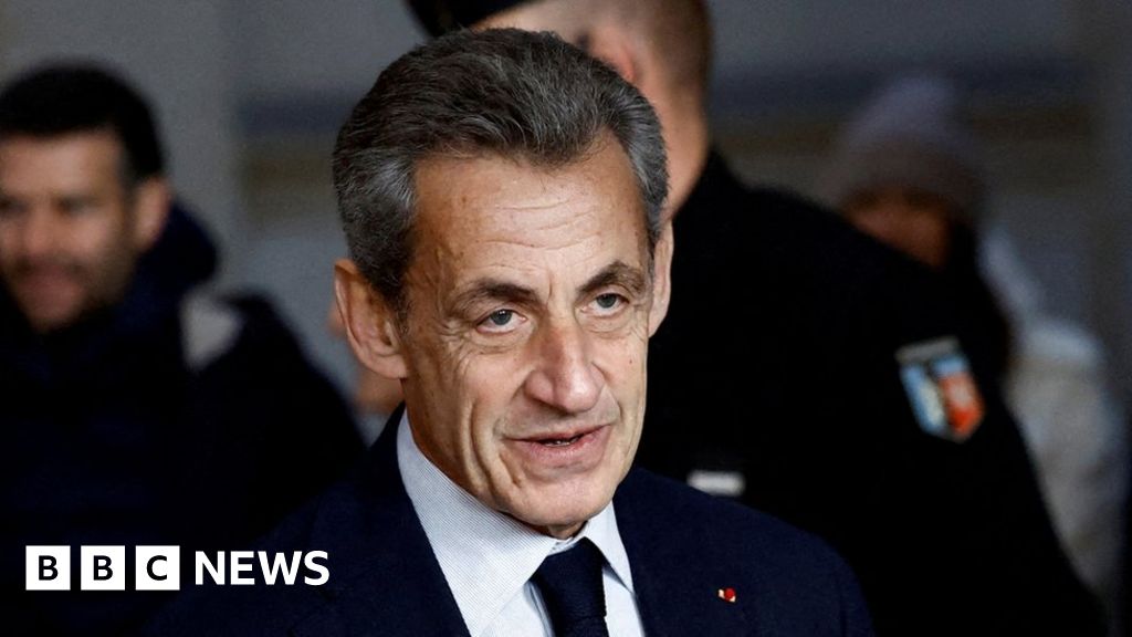 Nicolas Sarkozy Sarkozy wears tag after loss