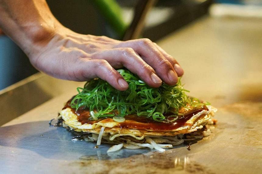Sauerkraut or sardines?  Hiroshima’s pancake goes