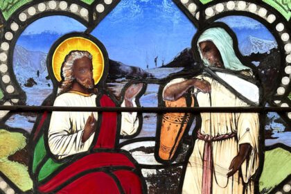 Stained glass window depicts Jesus Christ with