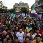 Syrians protest al-Assad’s participation in Arab