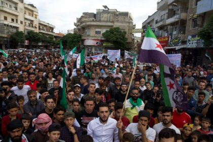 Syrians protest al-Assad’s participation in Arab