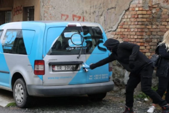 The Serbs removed the license plate and wrote Serbian symbols