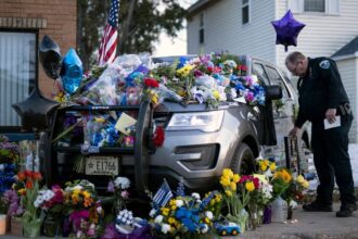 The Wisconsin cop killer had a history of domestic violence