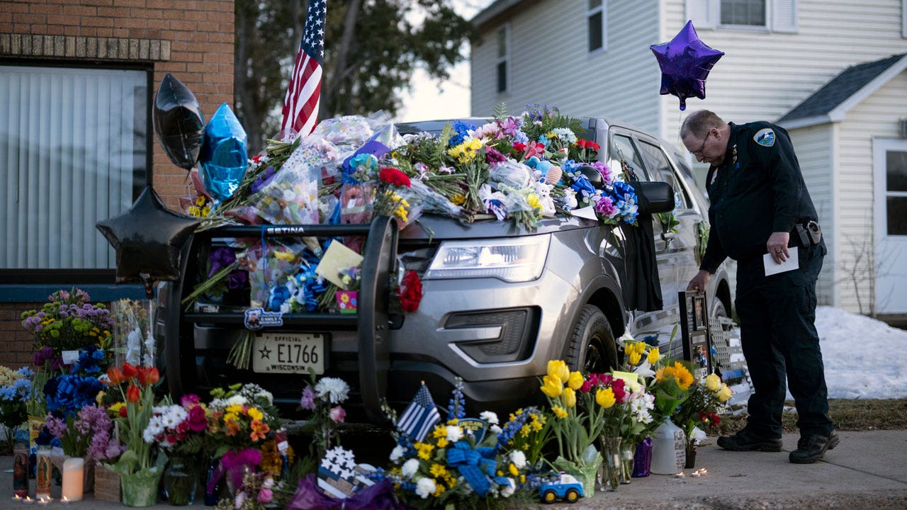 The Wisconsin cop killer had a history of domestic violence
