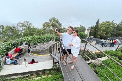 Tourists visit Penang Hill to escape the heat of the city