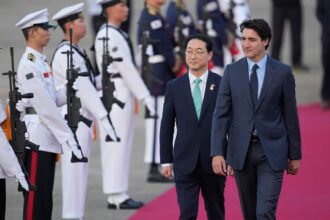 Trudeau addresses the press after a visit to South