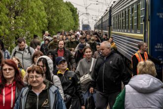 Ukrainians return home, renewed and resigned
