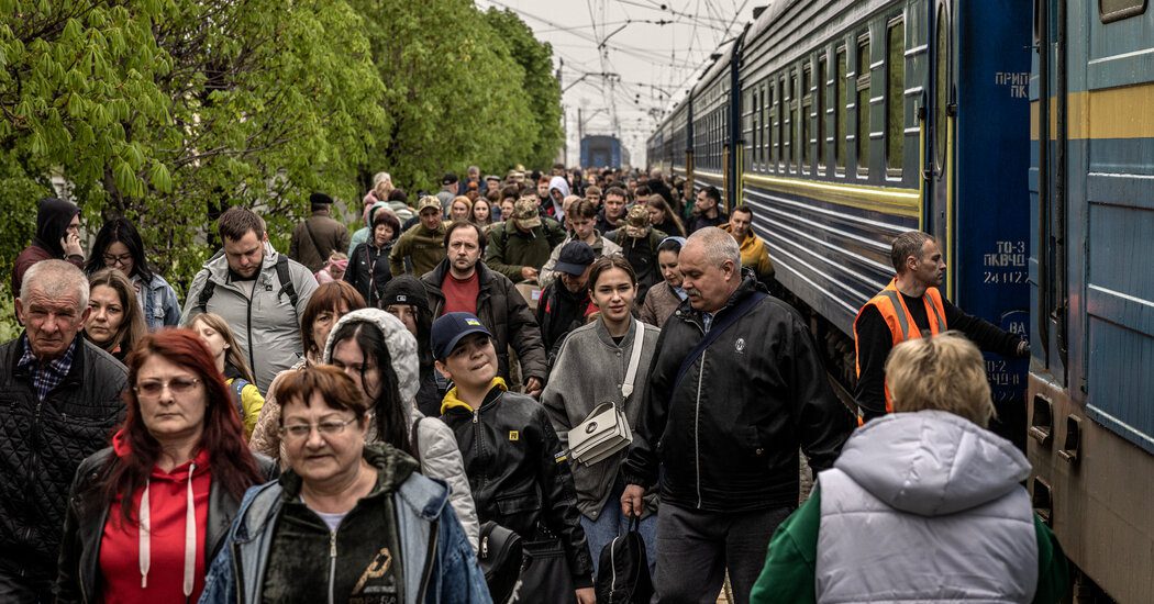 Ukrainians return home, renewed and resigned
